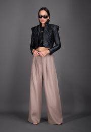 Model wearing top, pants, and leather jacket, front view – East Vibe